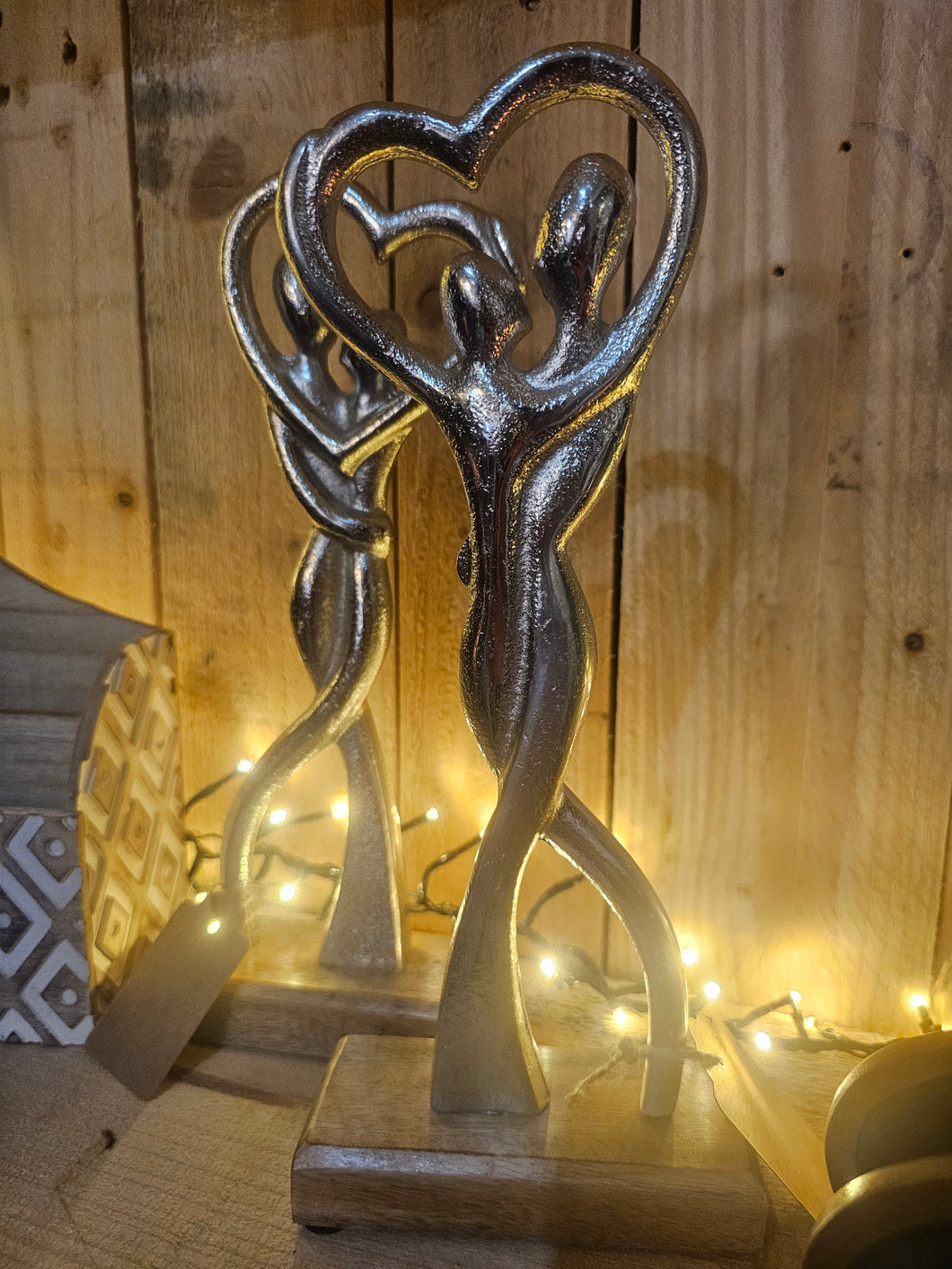 Couple on wooden base