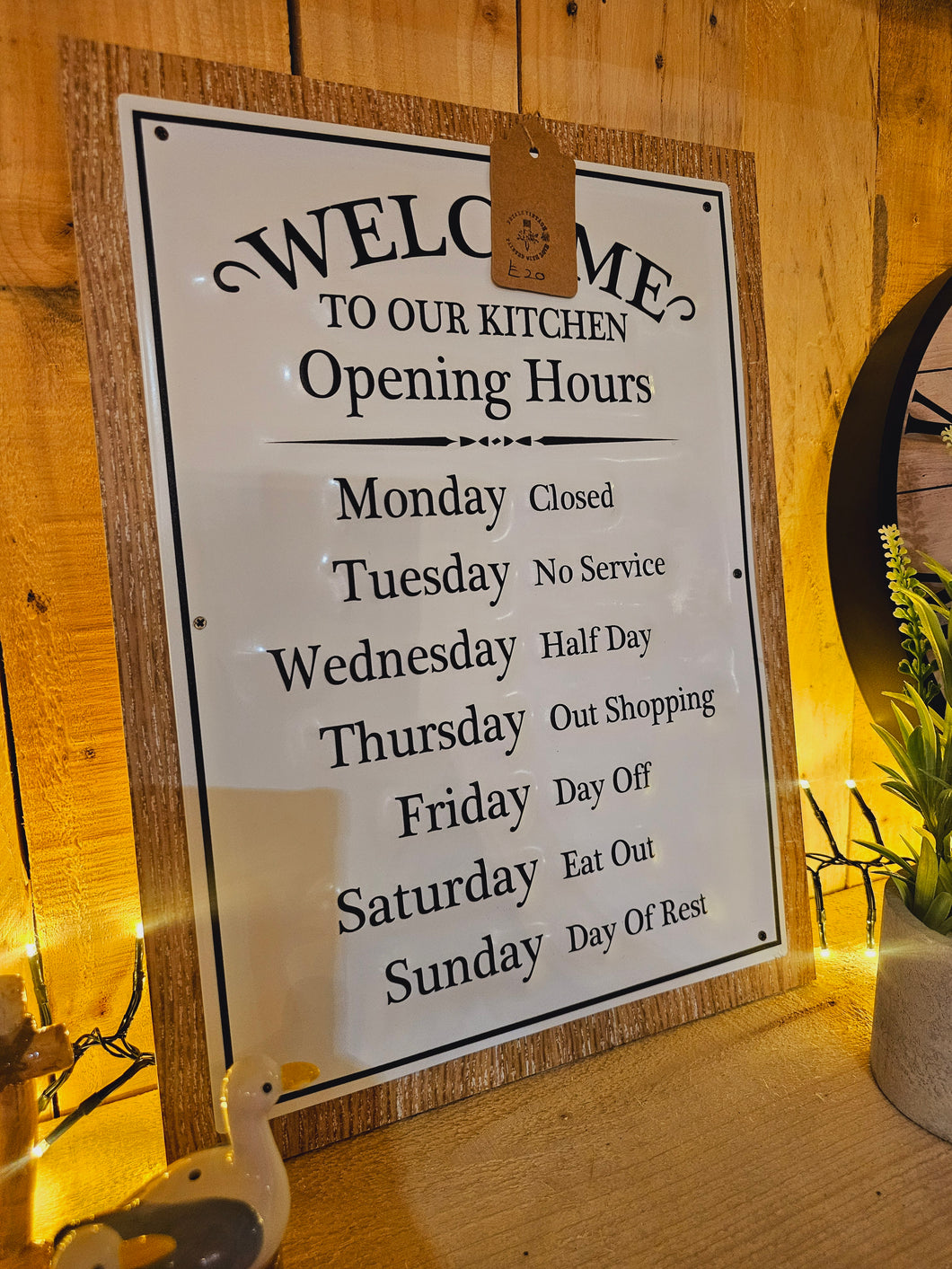 Kitchen opening times plaque