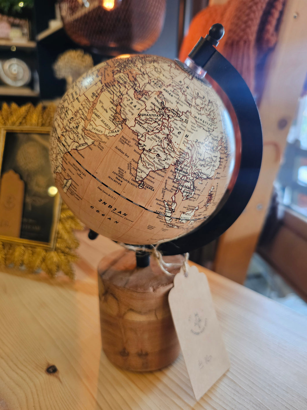 Globe - on wooden base